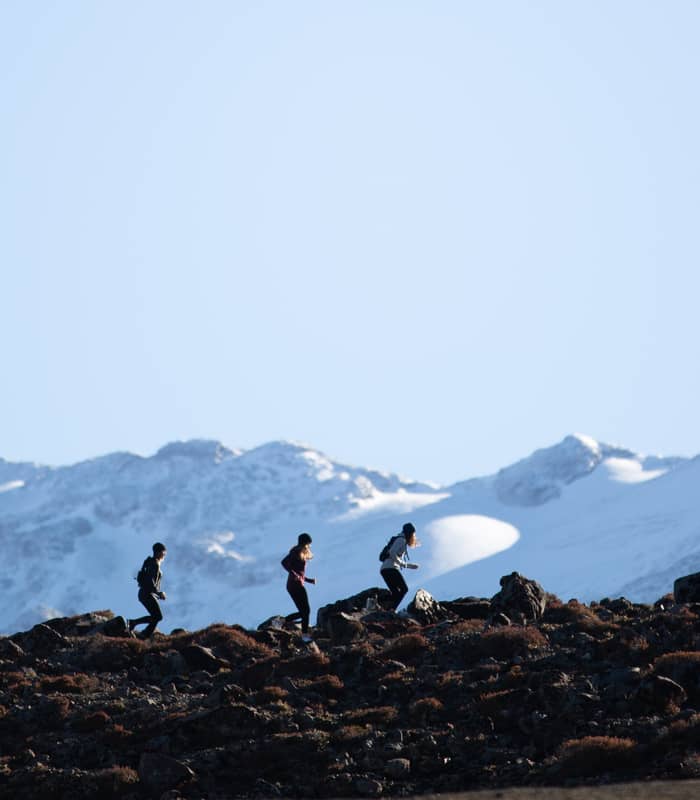 Group of runners running up Ruapehu. 